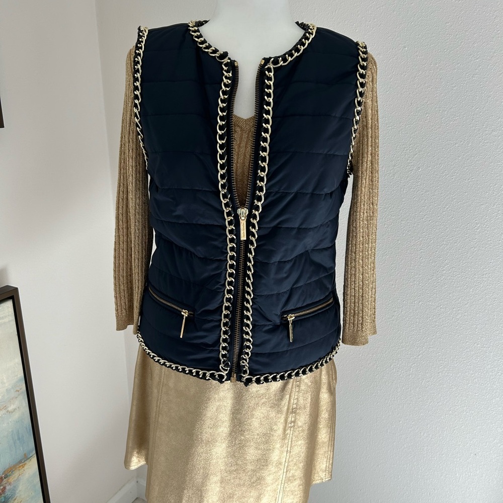Michael Kors sleeveless puffer jacket, size M.